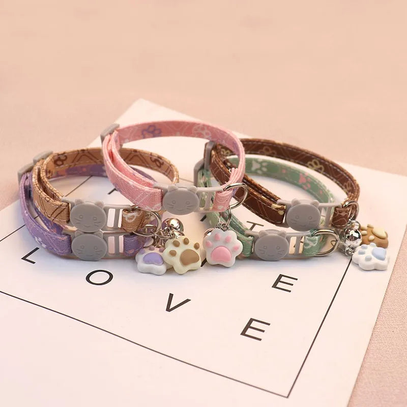 Adjustable Pet Collar with Bell – Cute Footprint Safety Necklace